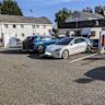 Top Stock Movers Now: Tesla, Shell, Uber, and More