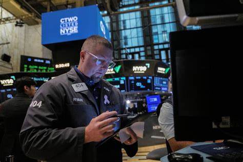 Trading Day: Wall Street's twin peaks