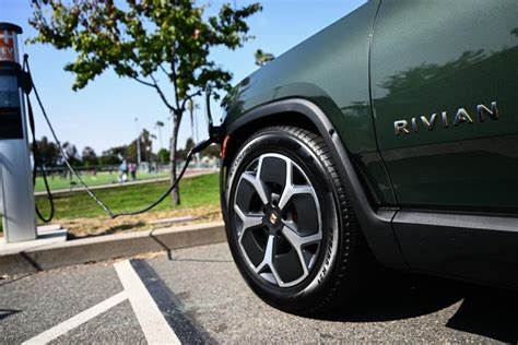 Rivian downgraded, PayPal upgraded: Wall Street's top analyst calls