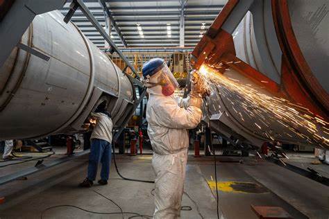 China's May industrial profits slip back into sharp decline