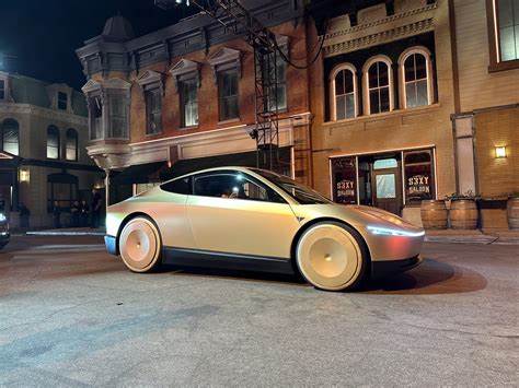 Tesla Clings to the Trillion-Dollar Club. How to Stay In? AI