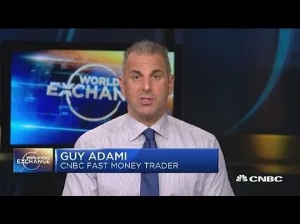 'Fast Money' traders Tim Seymour and Guy Adami hula dance with 'Fast Money Live' audience members - CNBC