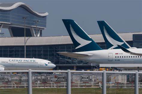Cathay Pacific says profit drops on lower fares, growth plan on track - Yahoo Finance