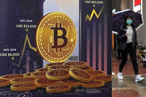 Regulators approve new bitcoin funds in move that could spur more investment in the digital currency - The Associated Press