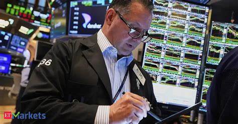Nasdaq, S&P 500 close lower, weighed by tech stocks, Dow ends up