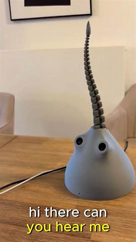 Show HN: Shoggoth Mini – A weird tentacle robot powered by GPT-4o and RL