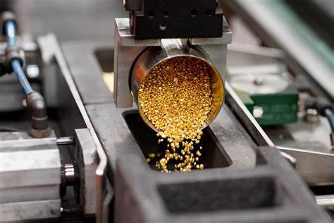 Gold Holds Ground as Investors Await US Jobs Data, Tax Bill Vote