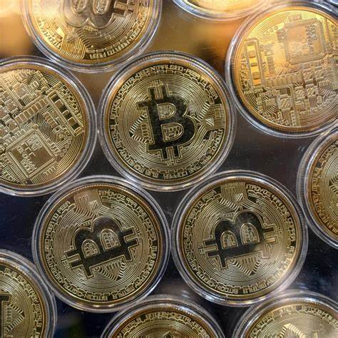 Bitcoin drops to new two-month low as world markets sell off