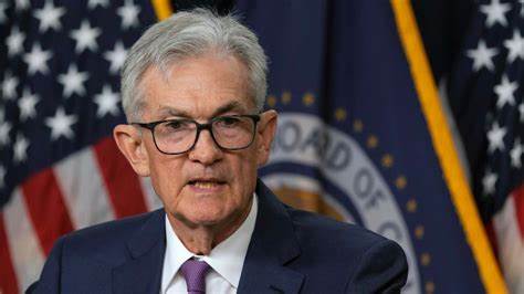 Powell says Fed may need to cut rates, will proceed carefully