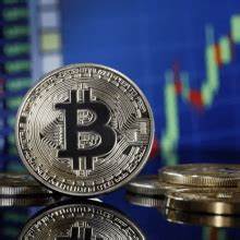 Bitcoin regains $1 trillion market cap as the cryptocurrency hits over two-year high - CNBC