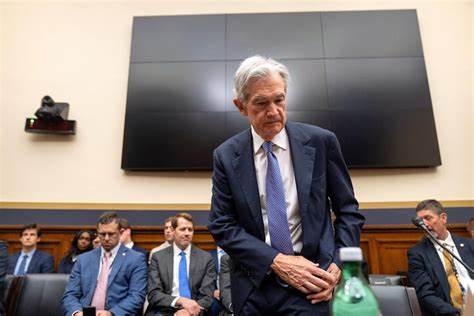 Powell says Fed rate cut is on hold; Trump demands cuts - Chicago Tribune