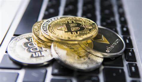 Coinbase’s stock slides nearly 30% as Bitcoin tanks - AOL