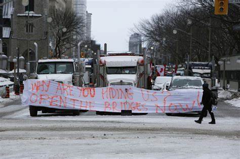 Canada Says It Will Freeze Bank Accounts of 'Freedom Convoy' Truckers - Business Insider