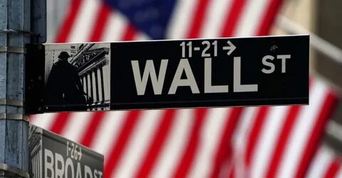 Wall Street soars to records as Dow leaps 500 in a rate-cut rally that swept the world