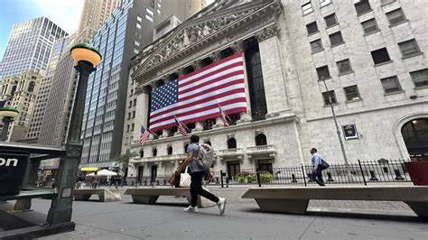 Instant view: Wall Street hits record highs after turbulent months