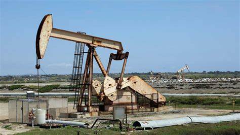 Equities flatten, oil rises after Fed holds rates and Mideast conflict rages on