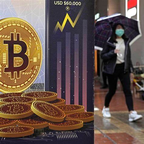 Bitcoin hits record above US$71,000 as demand frenzy intensifies - South China Morning Post