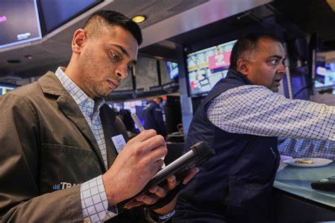 Wall Street rallies as a cut to interest rates next week looks more certain