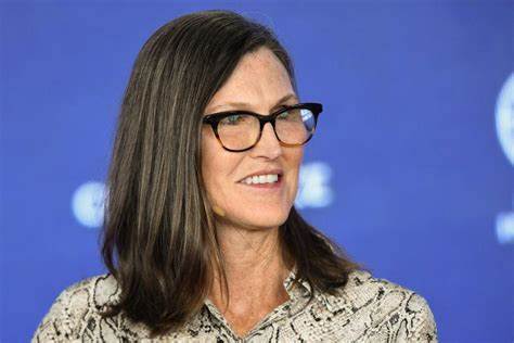 Cathie Wood picked up over $20 million worth of Coinbase as the stock plunged after SEC charges - Fortune