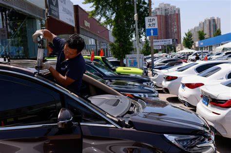 Exclusive-China auto industry inflates sales by exporting new cars as 'used'