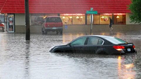 King Street in Boone flooded, cars moving through floodwaters - WRAL News