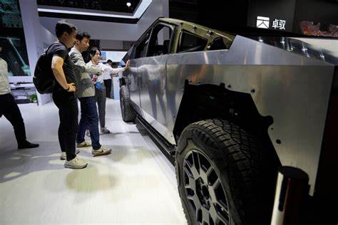 Automakers focus on the global market, chide the US over tariffs at Shanghai's auto show