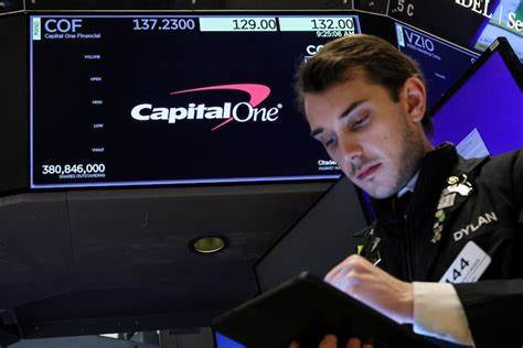 Capital One reports higher profit as interest income, fees rise