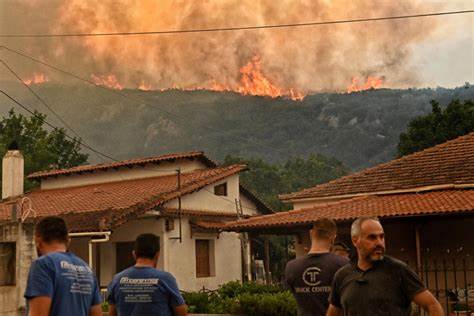 'Total destruction' as Greece battles wildfires; homes burned 