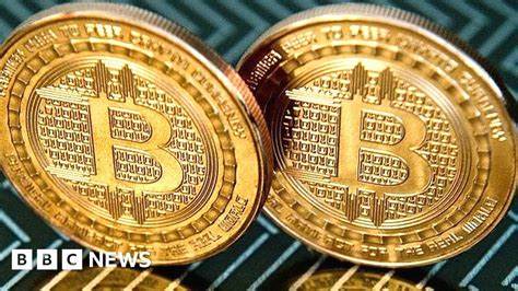 Bitcoin currency hits new record high - BBC