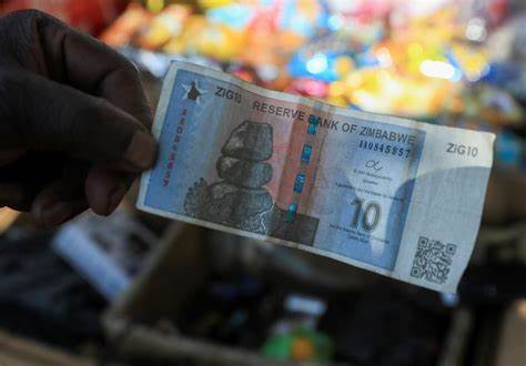 Zimbabwe allows currency to slump over 40%, hikes policy rate - Reuters