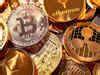 US charges 18 people, companies with cryptocurrency fraud - Economic Times