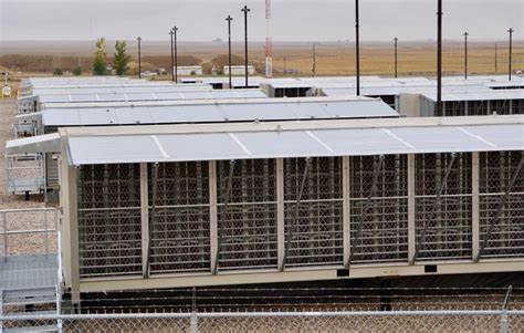 Bitcoin mining uses so much electricity that 1 city could curtail facility's power during heat waves - CBC News