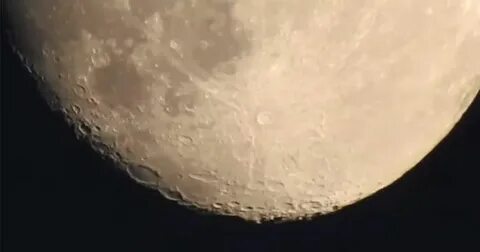 Super long camera zoom goes from city street to moon’s surface - Mashable