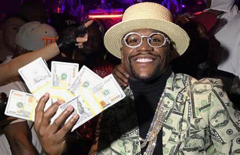 Floyd Mayweather settles for shilling alleged $32M cryptocurrency scam without disclosing he was paid to do so - Yahoo Sports