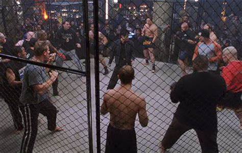 Jet Li in the cage against MMA fighters in 'Cradle 2 the Grave'