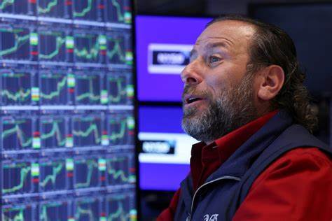 Dollar notches weekly gain as traders reassess rate cut expectations - Reuters
