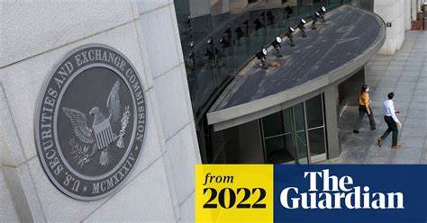 Cryptocurrency fraud scheme busted by US securities agency - The Guardian