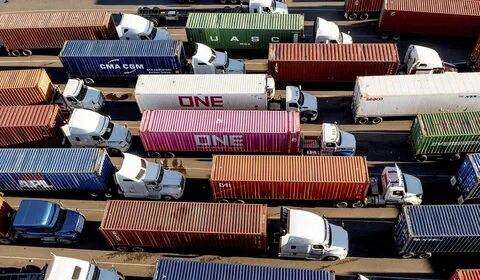 China slaps extra tariffs of up to 15% on imports of major US farm exports and adds trade limits - The Associated Press