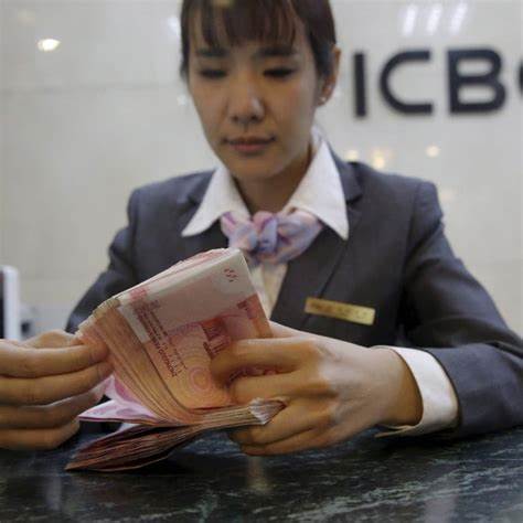 China’s yuan weakens past key threshold to 2-month low after slew of downbeat economic data