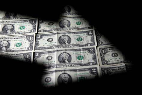 Dollar skids after soft U.S. economic data; impact of OPEC+ cuts fades - Reuters.com