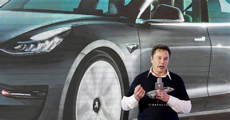 Teslas can now be bought for bitcoin, Elon Musk says - Reuters