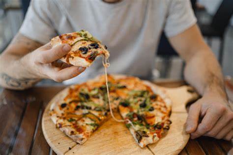 Man Who Spent $446 Million on Pizza Has Advice for Tesla Fans - Bloomberg