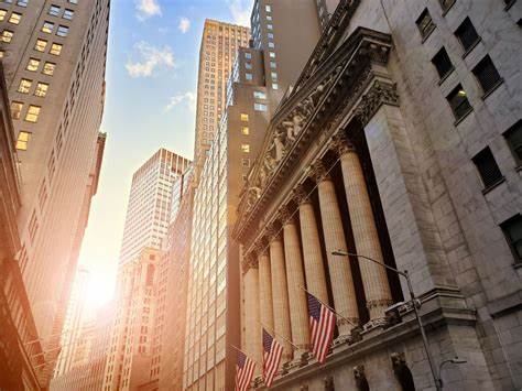 Stocks Finish Mixed as Chip Stock Strength Pushes Nasdaq to a Record High
