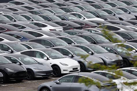 Tesla quarterly deliveries seen falling again