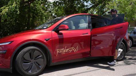 Videos show Tesla robotaxi braking hard without warning and wrong side of road