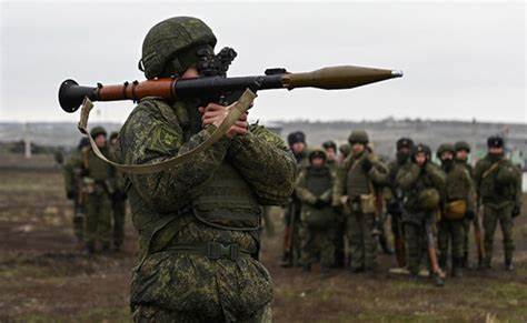 Russia boosts the size of its army to 1.5 million active personnel - blaming 'threats' on its borders and 'Western aggression'