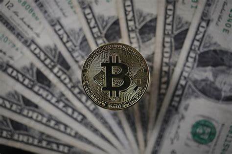 Bitcoin surges to record $28,500, quadrupling in value this year - The Guardian