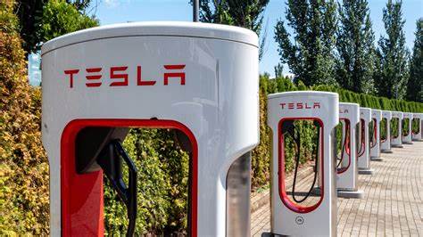 Crowded by EV Rivals, Tesla Preps For Critical Earnings Report