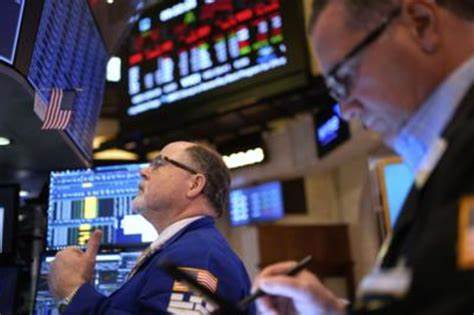 Wall St futures slip as markets await clarity on tariffs