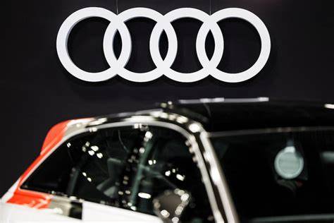 Audi cuts forecast over US tariffs and restructuring costs